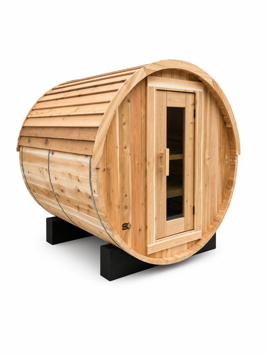The Sweat Barrel by Sweat Kingdom, a cedar barrel sauna with a glass-panel door
