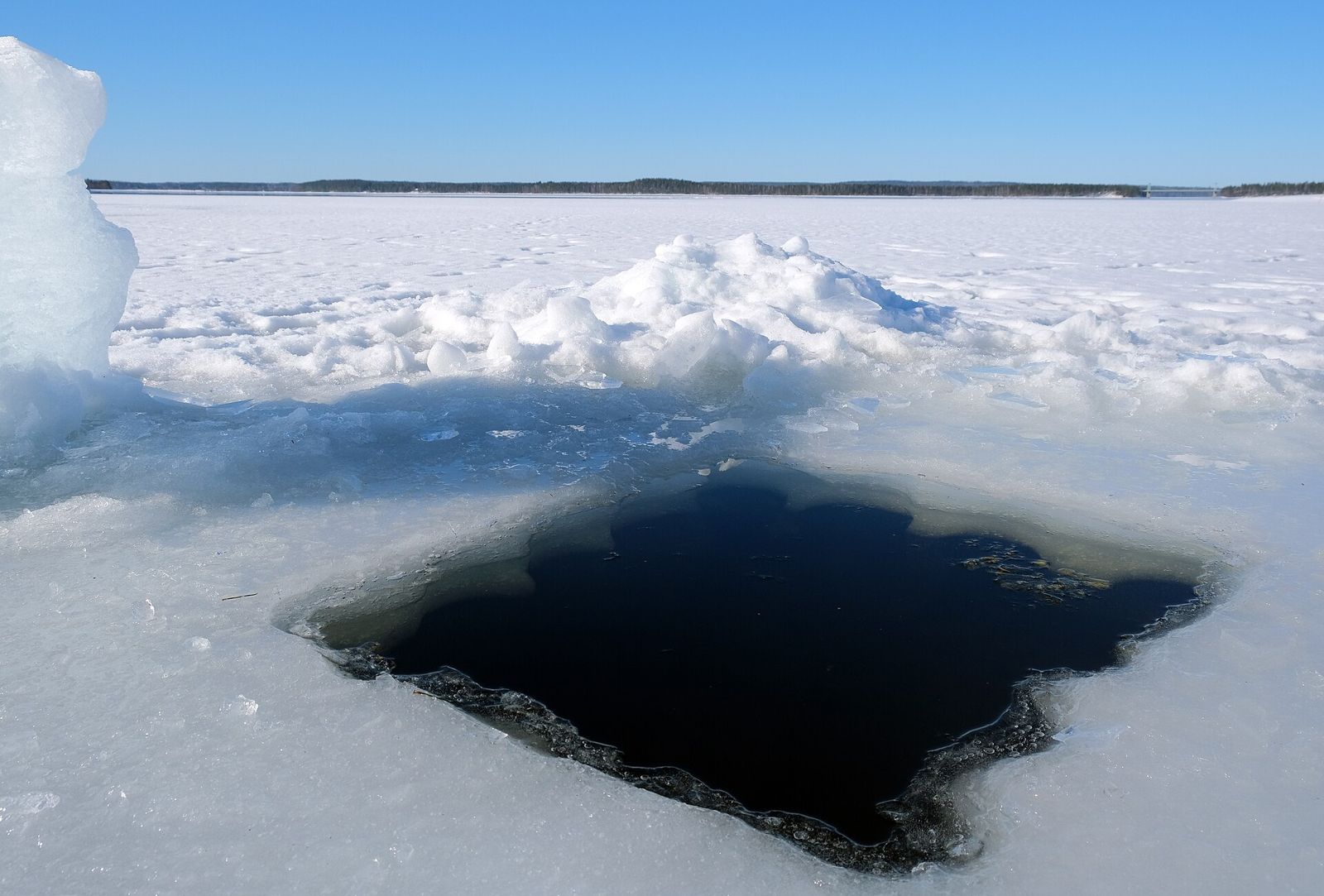 A swimming hole cut in lake ice